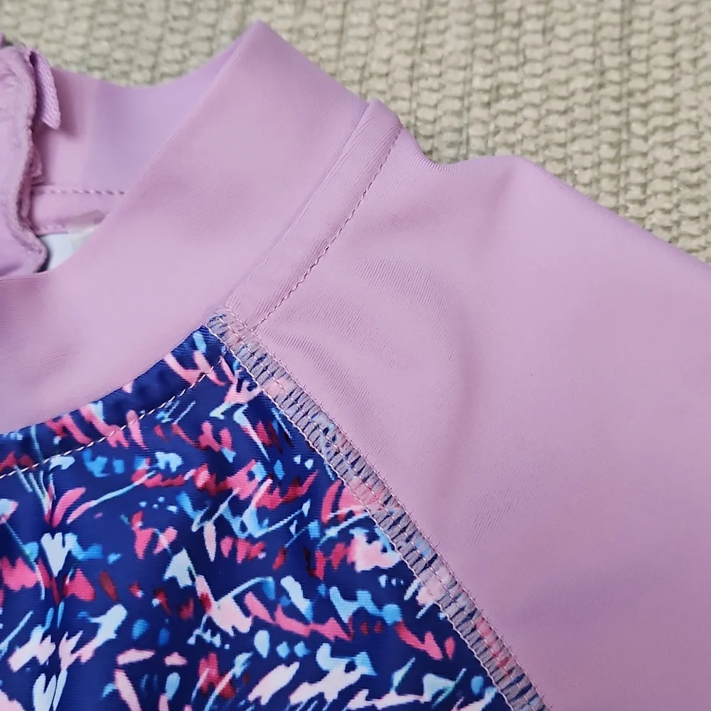 Eddie Bauer Girls Rash Guard Swim Shirt Size 10/12 Short Sleeve Zip Back Purple